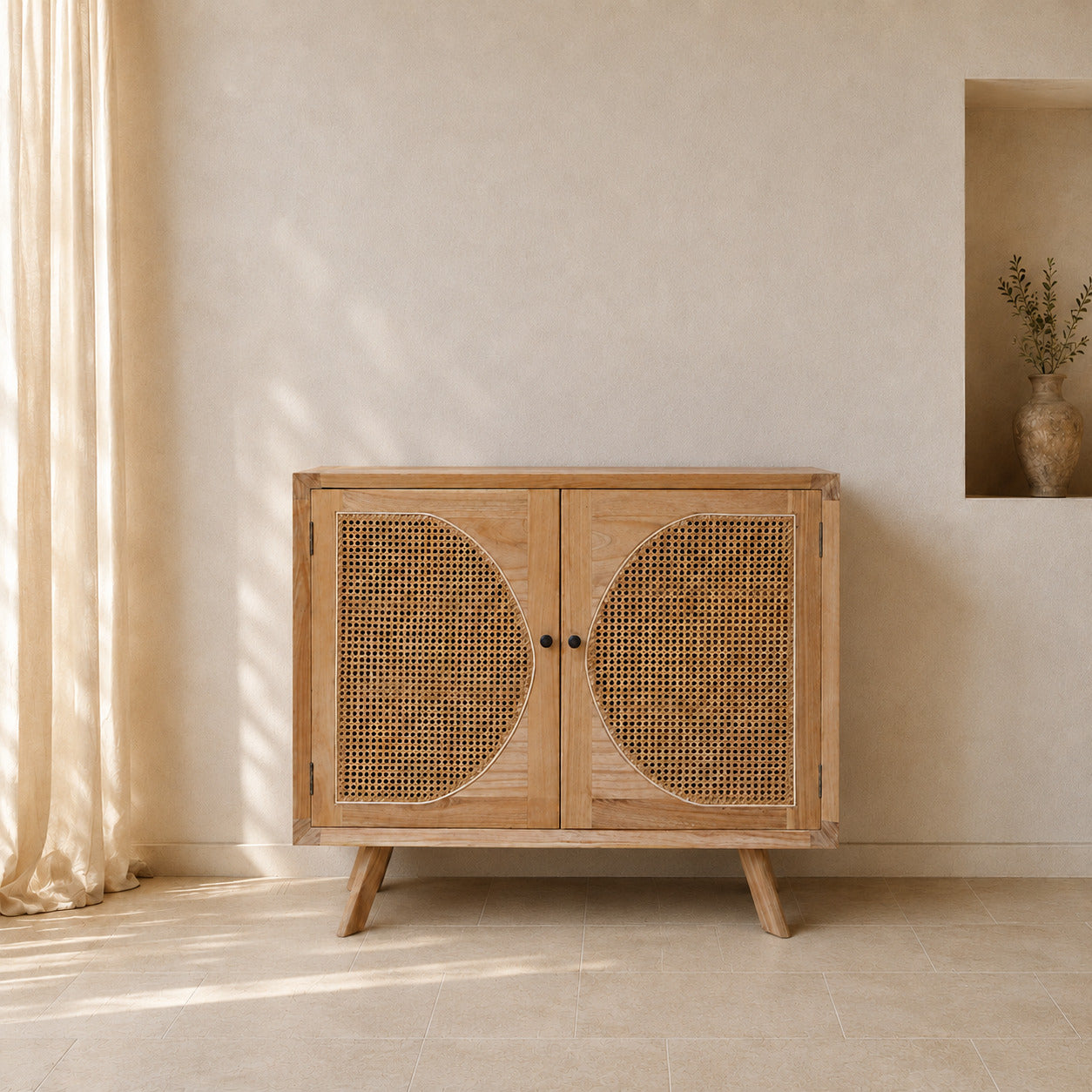 Rattan Cabinet DF24-83 placed naturally against a Mediterranean interior wall