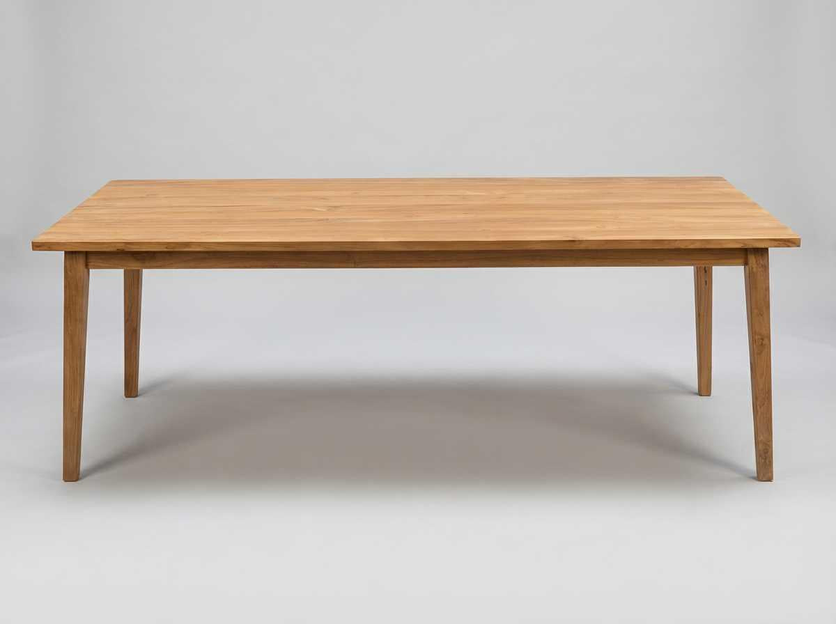 Coastal large solid wood dining table on a neutral background