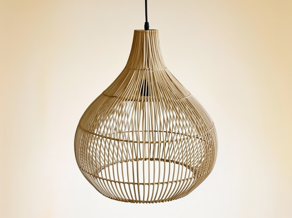 Aurelia woven rattan pendant lamp on a neutral background
