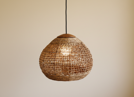 Solea woven abaca pendant lamp on a neutral background